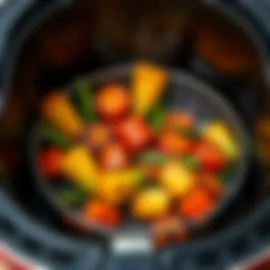 Deliciously roasted vegetables in an air fryer basket